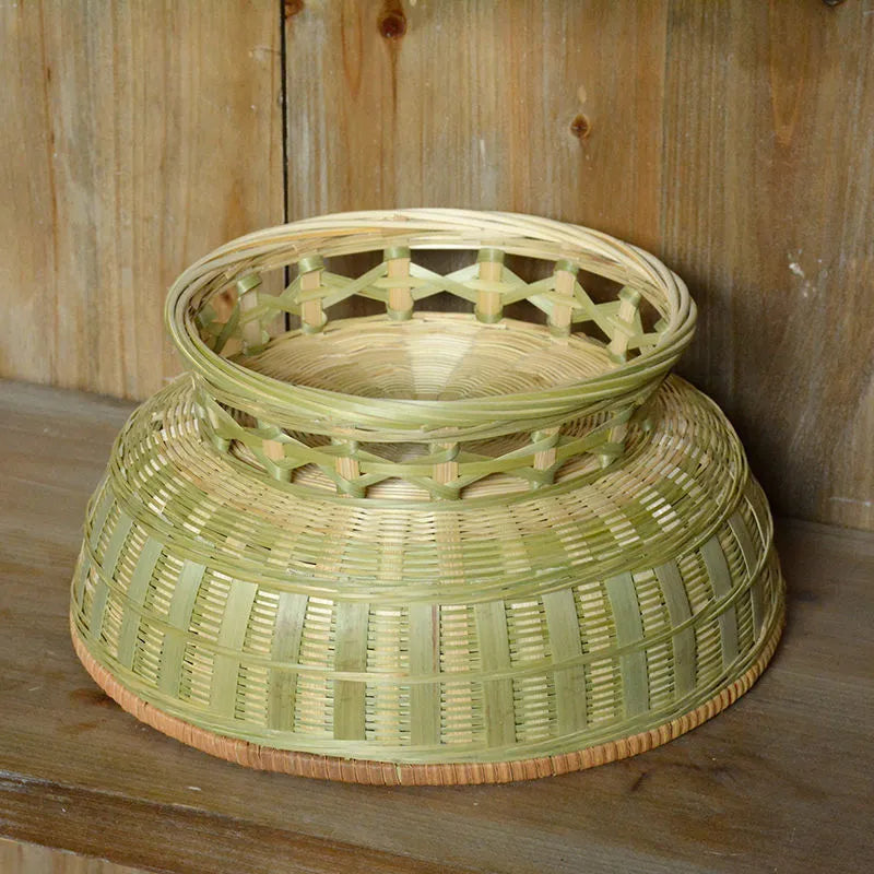 Handmade natural bamboo storage basket set showing three different sizes for household organisation