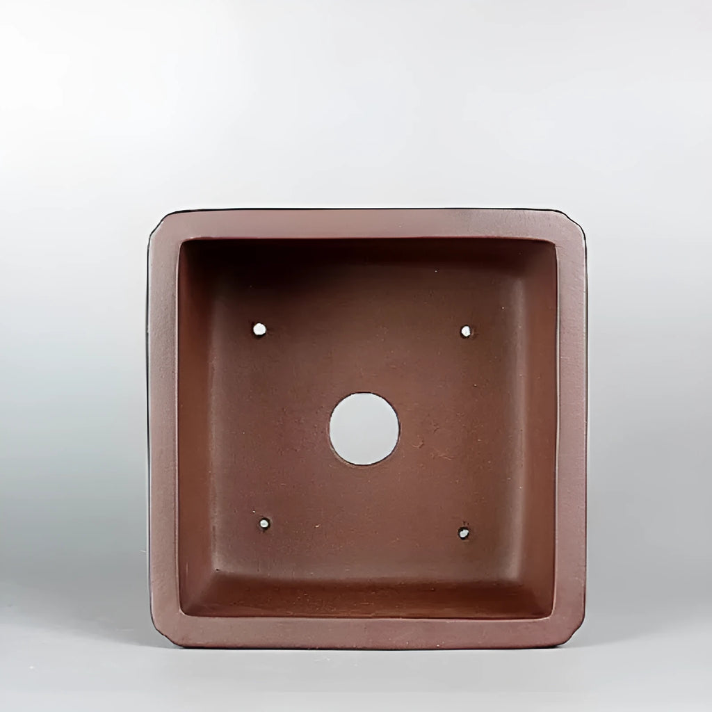 Brown antique purple clay flower pot with classical style and drainage hole