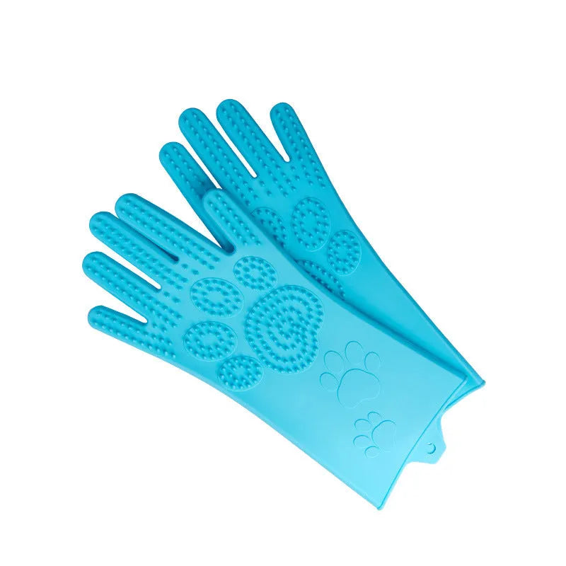 Blue silicone scrubbing gloves showing textured palm and finger surfaces for cleaning