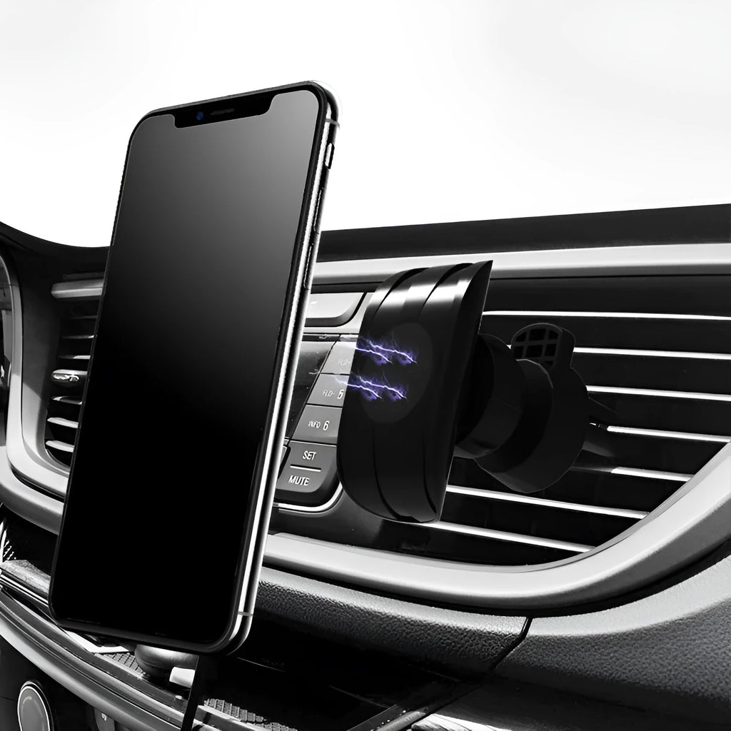 Black car phone holder mounted on vehicle air vent with adjustable clamping arms extended