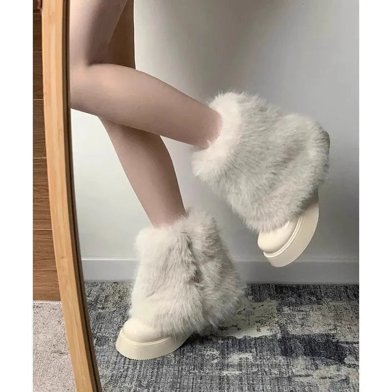 Women's low top snow boots with artificial plush construction and waterproof rubber sole