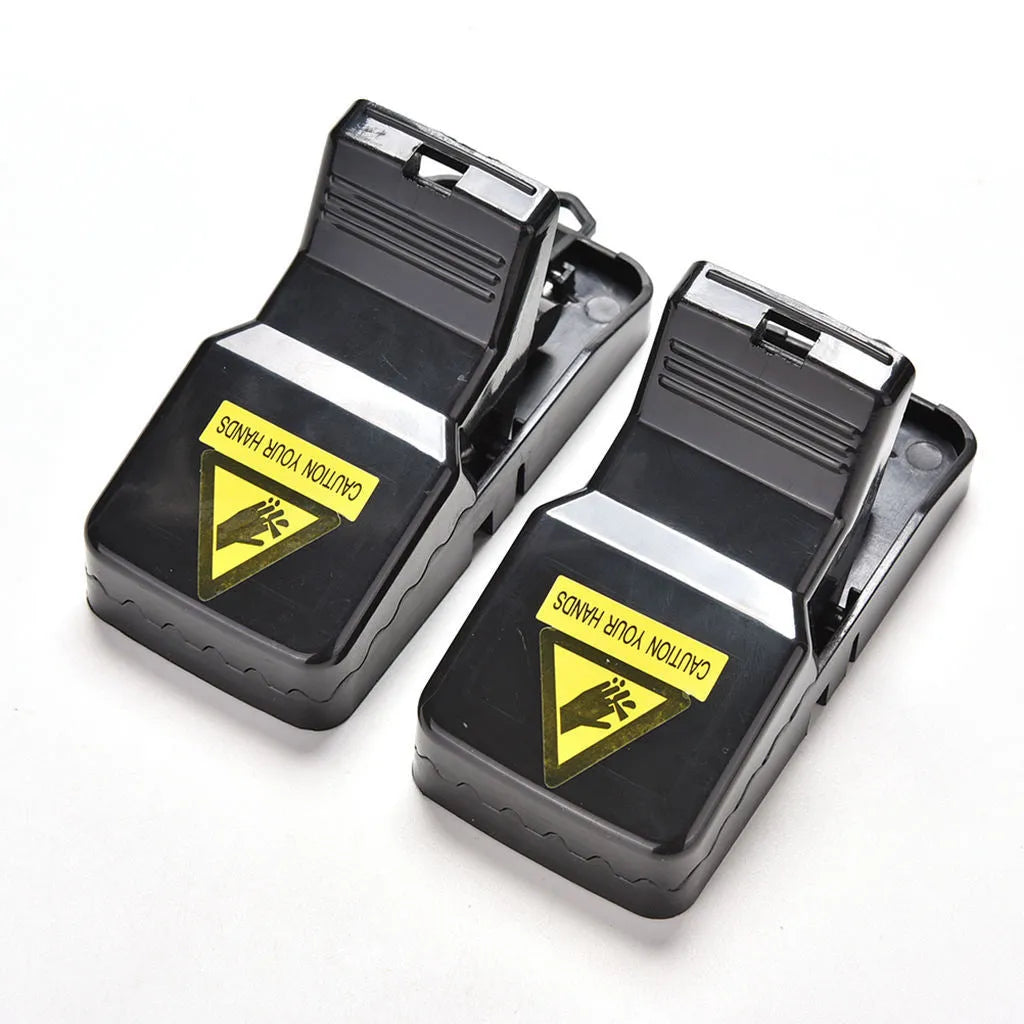 Six black snapping mousetraps made of PC+ABS plastic, shown with a ruler indicating 11cm length.