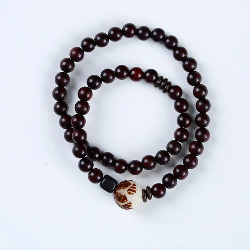 Natural rosewood double-ring bracelet with floral shape measuring 10mm wide, hand-knitted construction
