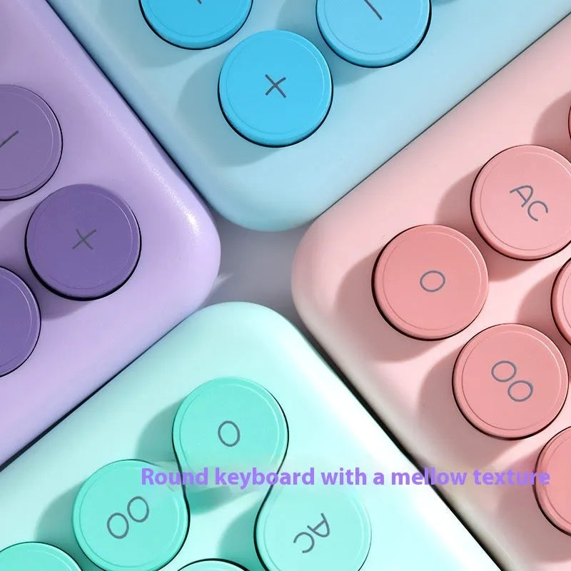 Gradient colour desk calculator showing violet, cherry blossom, blue and green shade options