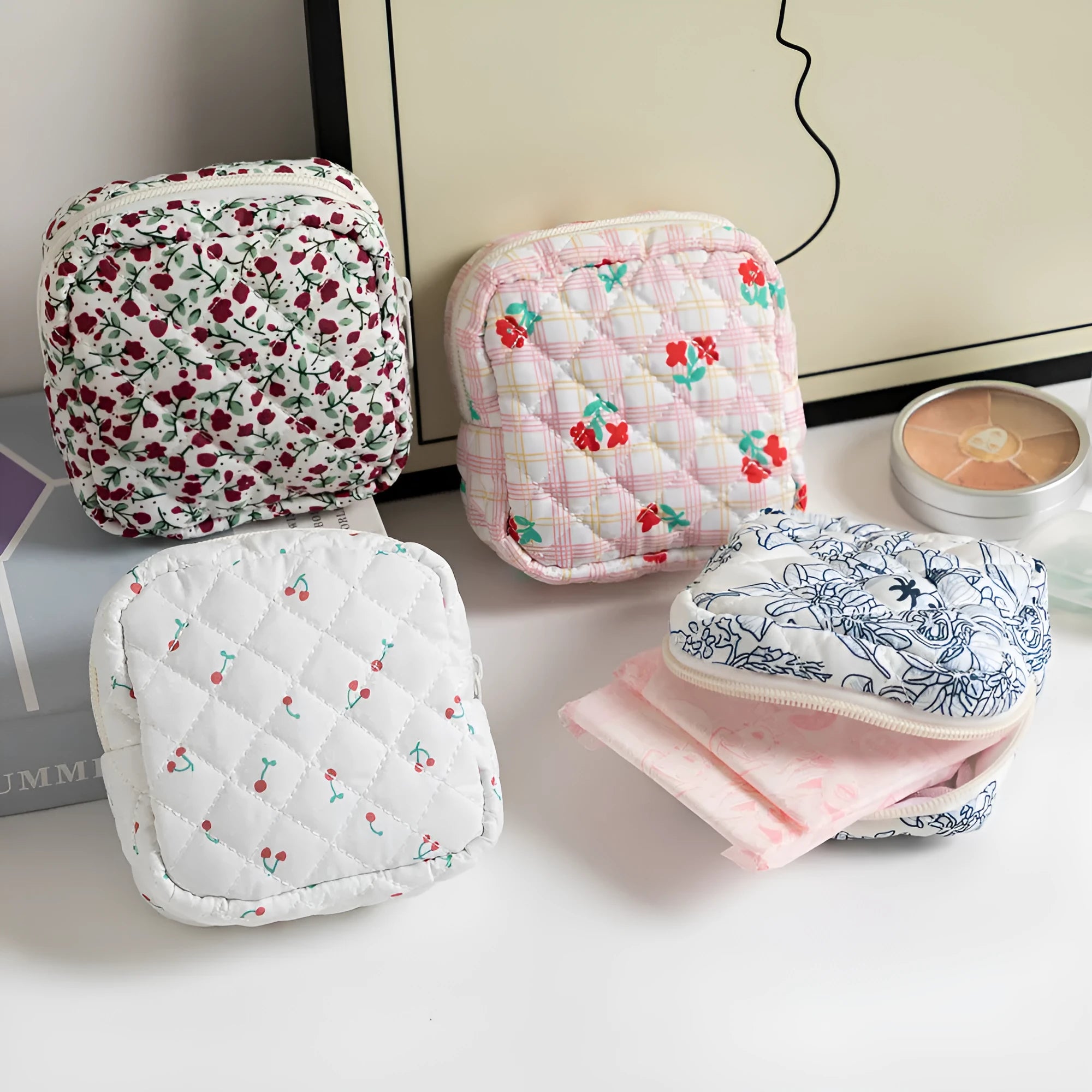 Women's floral patterned polyester key storage bag with sewing thread detail.