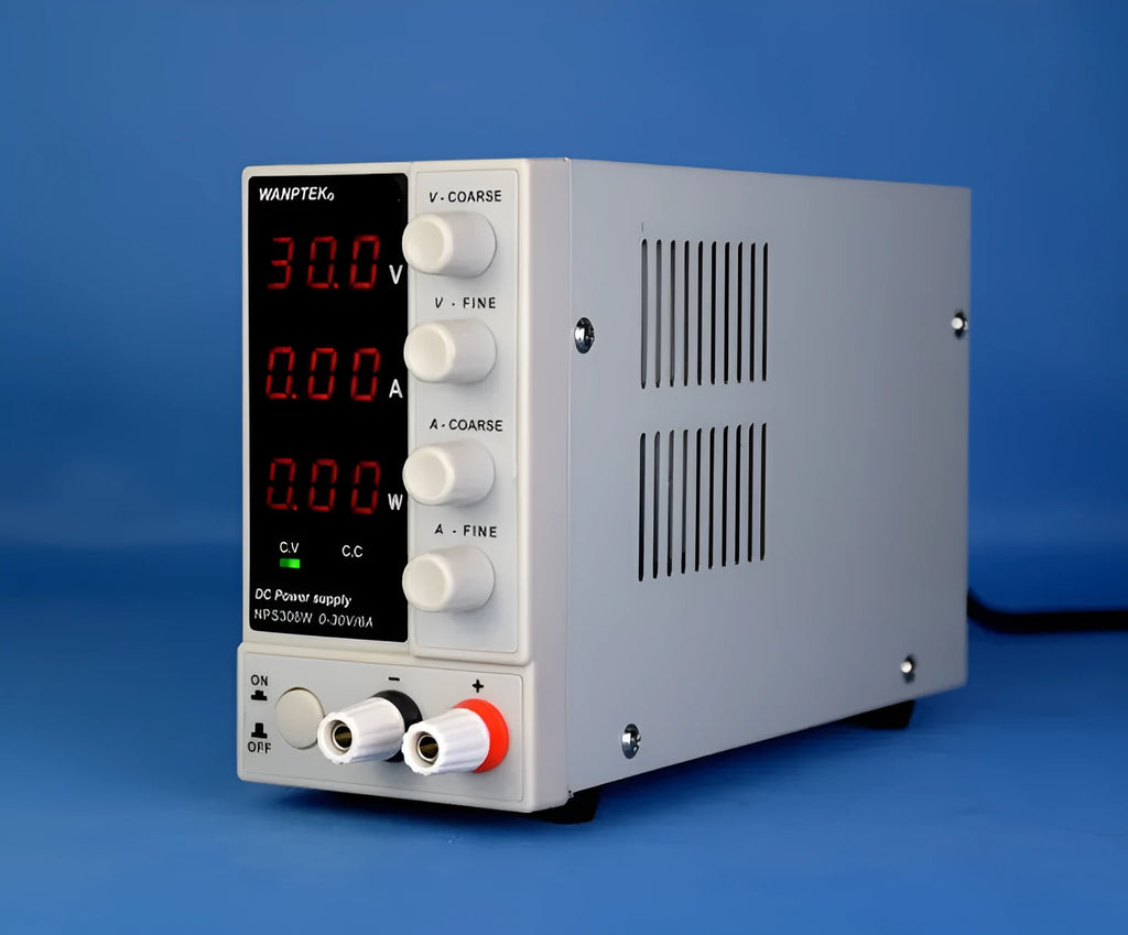 White adjustable DC power supply unit with digital display, model S605W, for electronics repair.