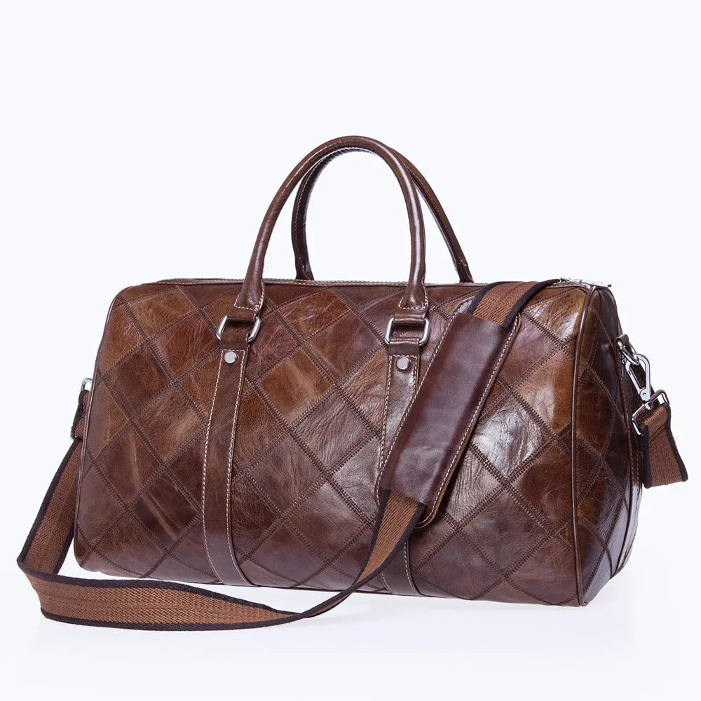 Vintage brown cowhide leather duffel bag with single shoulder strap showing internal organisation compartments