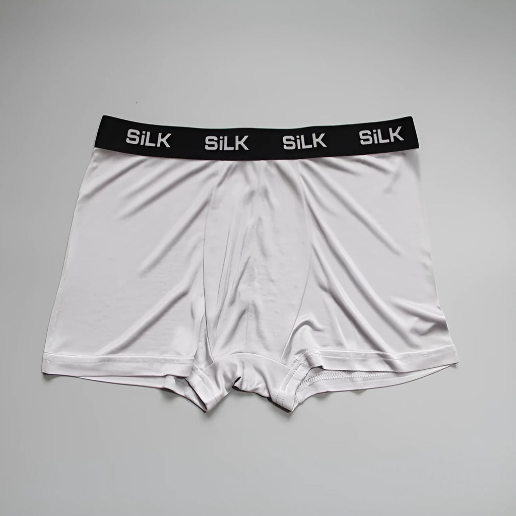 Men's silk shorts in navy blue with mid waist design and loose fit