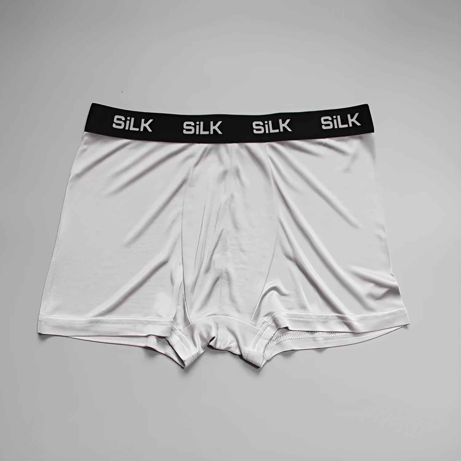 Men's silk shorts in navy blue with mid waist design and loose fit