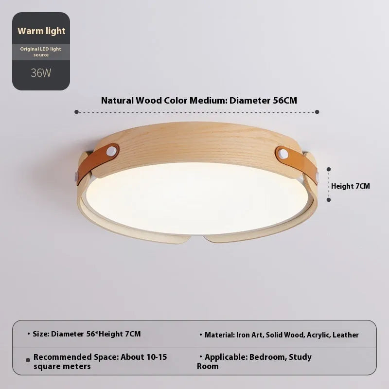 Japanese style wooden ceiling lamp with a round PMMA lampshade in warm light colour.