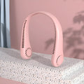 Pink USB rechargeable bladeless neck fan worn around a person's neck.