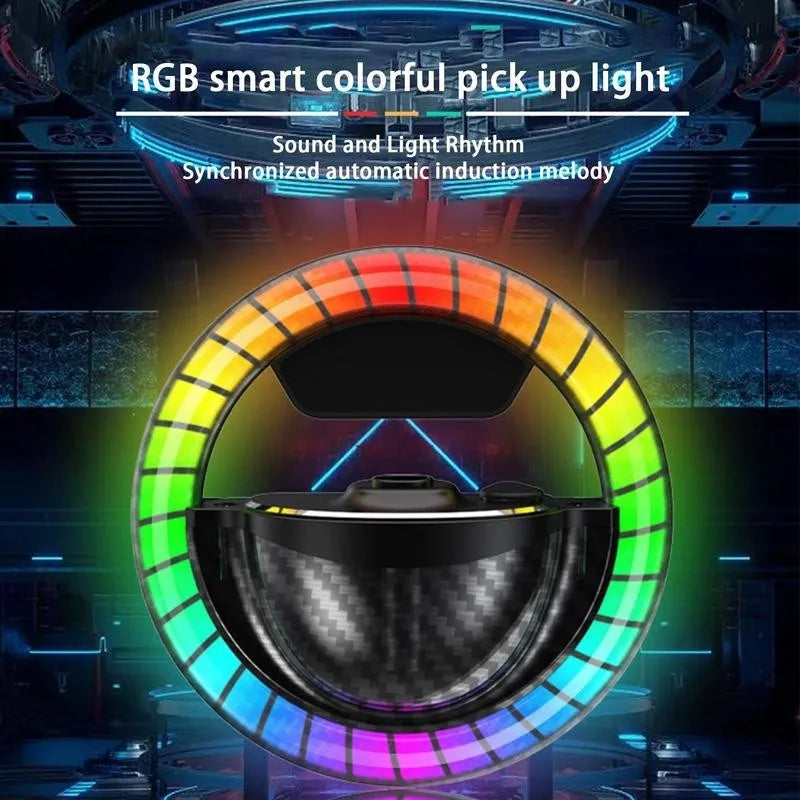 Black aromatherapy LED rhythm lamp with USB Type-C cable and essential oils on a table