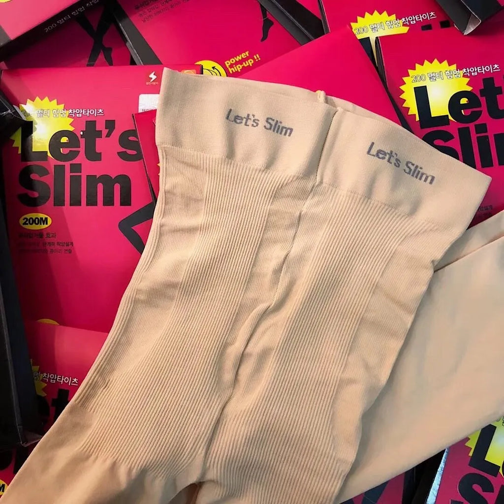 Beige and black stovepipe compression socks for hip and abdomen support