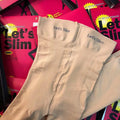 Beige and black stovepipe compression socks for hip and abdomen support