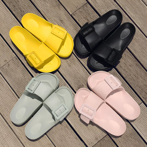 Grey Blue women's EVA flip-flop slippers with a silver buckle strap on a white background.