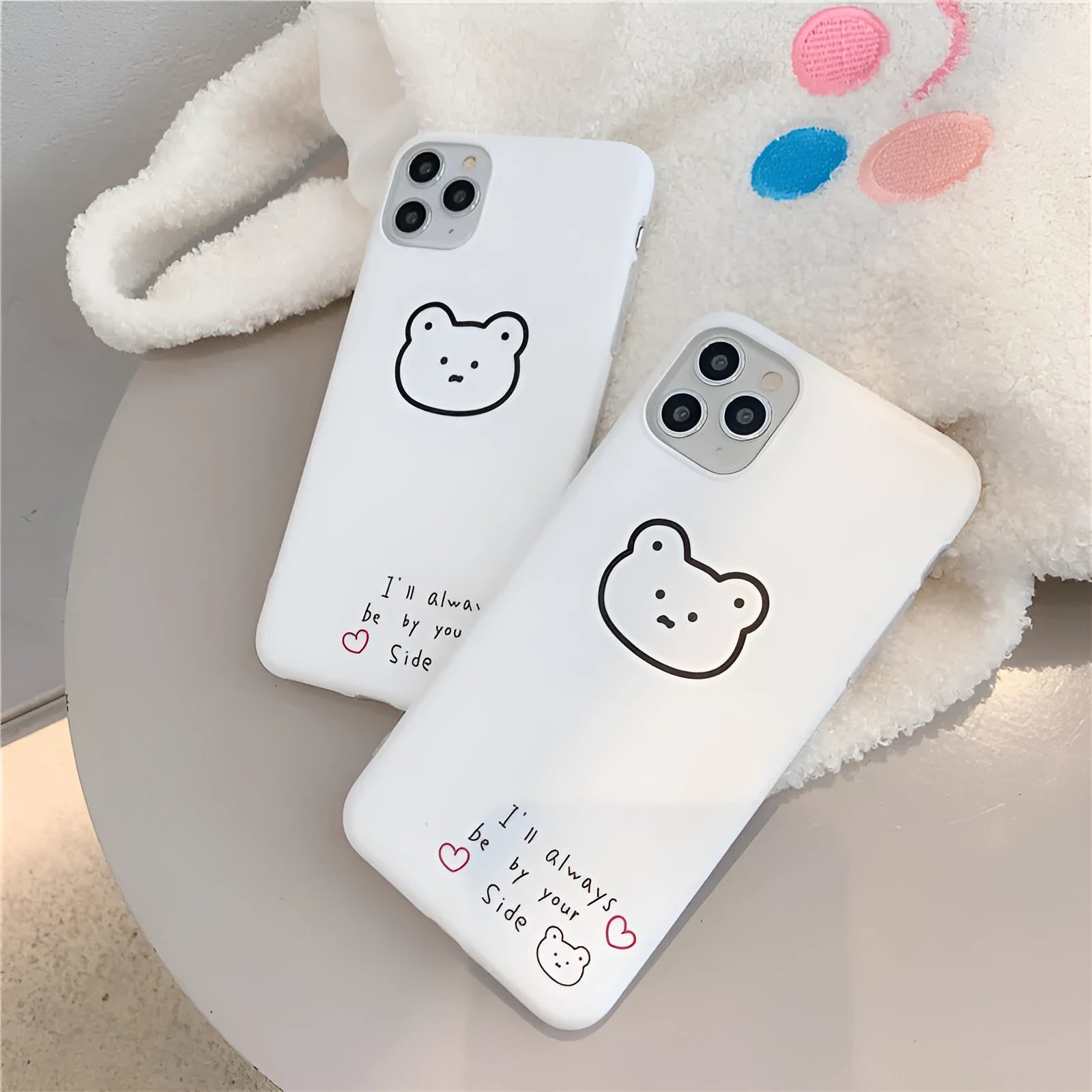 Soft silicone Apple iPhone case with a Korean cartoon bear design on the back.