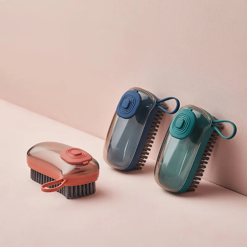 Automatic liquid cleaning brush for shoes and clothes with ergonomic grip in selected colour