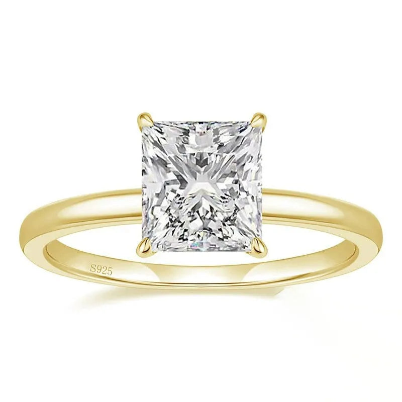 A simple geometric women's ring in polished 925 silver with a round zirconium crystal, shown in silver, gold, and rose gold colour options.