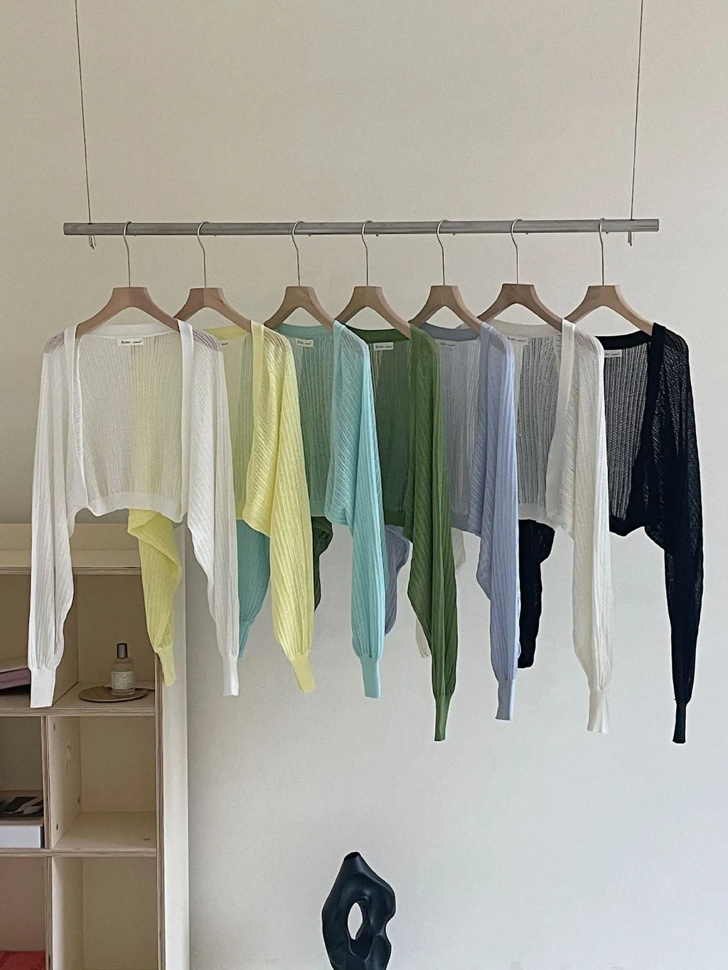 Hollow out lantern sleeve blouse in polyester linen blend fabric shown in apricot colour