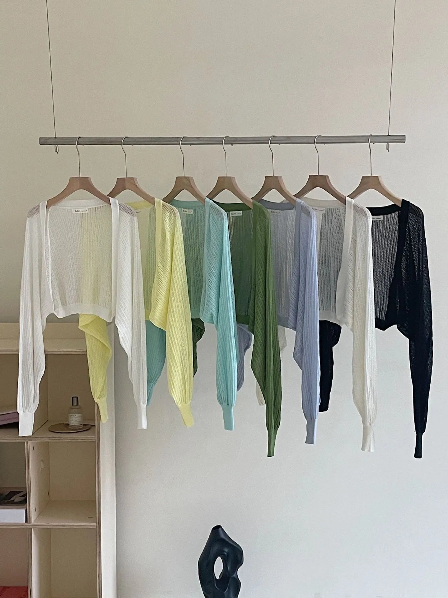 Hollow out lantern sleeve blouse in polyester linen blend fabric shown in apricot colour