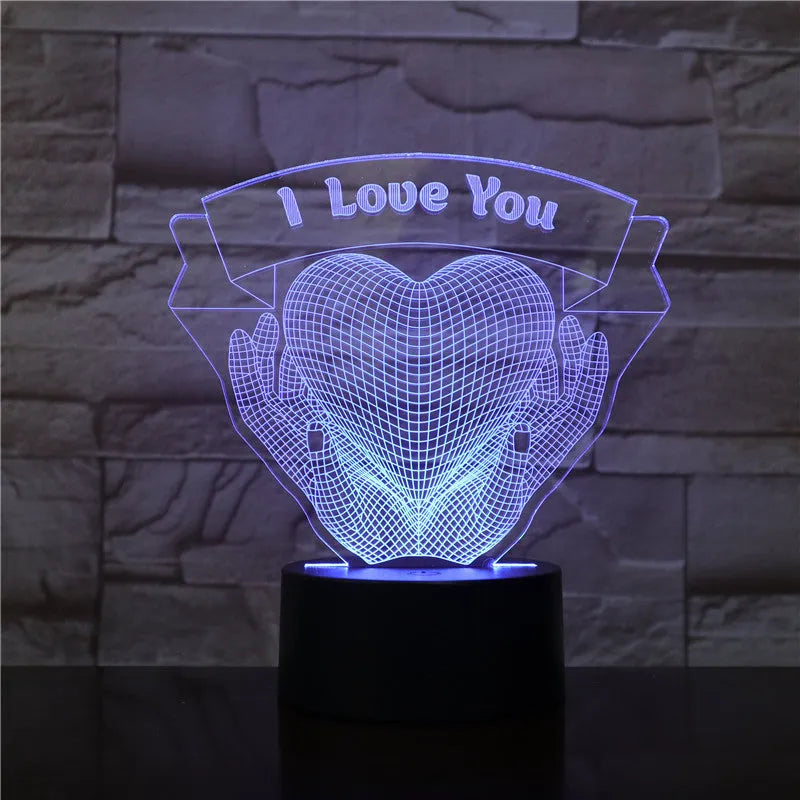 Valentine 3D night light with hands holding heart design in seven colour changing LED modes