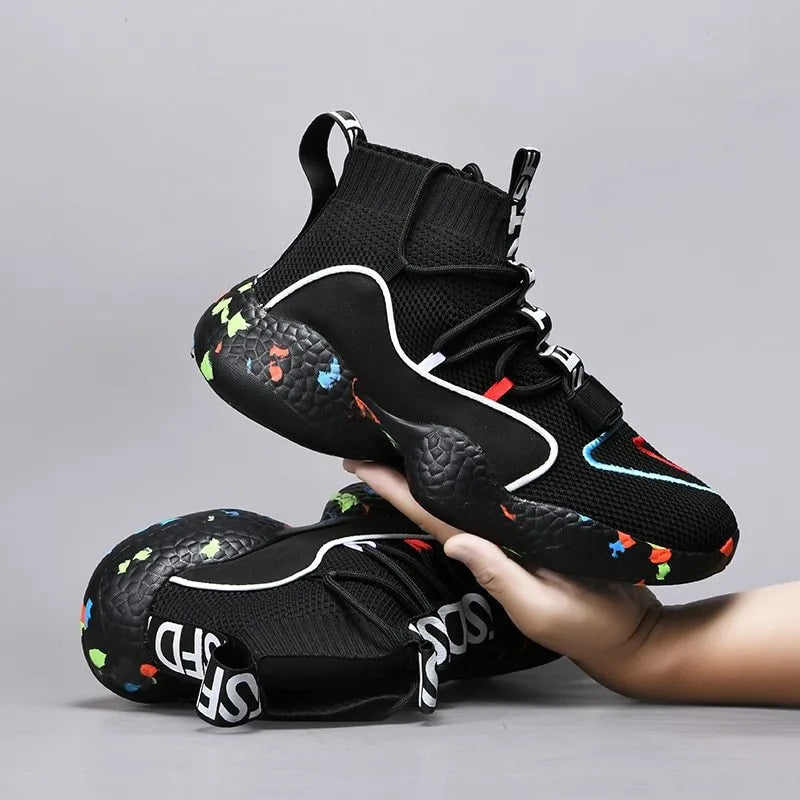 Men's camouflage pattern vulcanised sneakers with mesh upper and flat rubber sole.