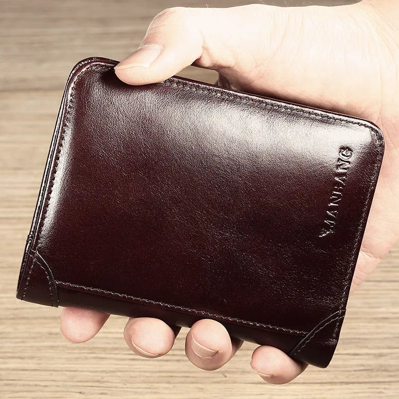 Men's black leather wallet open to show internal card slots, coin pocket, photo holder, and document section.