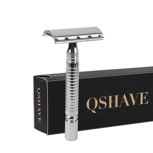 Double-edged safety razor kit with chrome finish, weighted handle, blades, and storage box