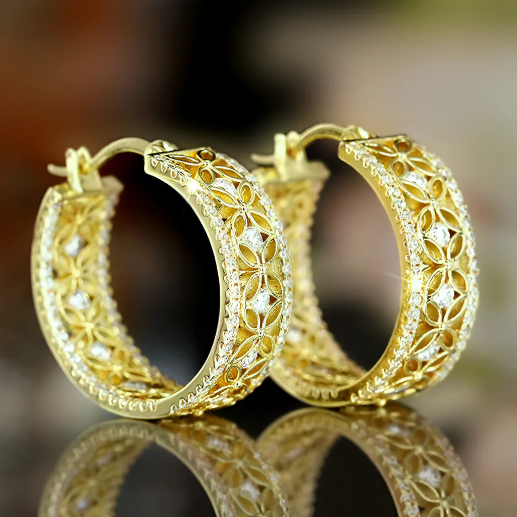Yellow gold geometric horse eye ear clips with floral butterfly design for women