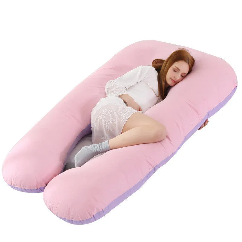 Large U-shaped pregnancy support pillow with removable cover in choice of fabrics.