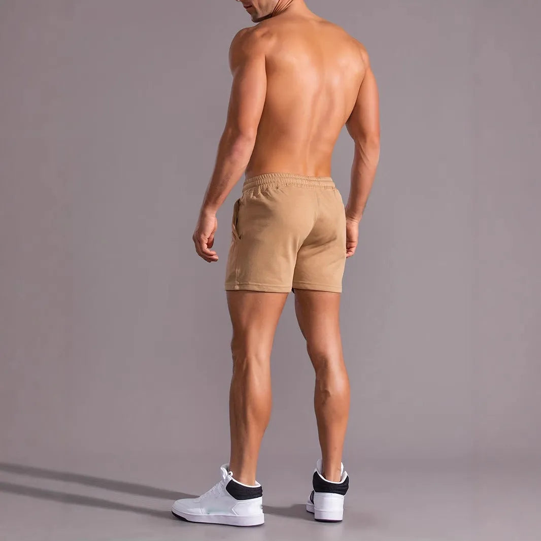 Men's khaki coconut printed sports shorts with straight leg design and micro elastic fabric