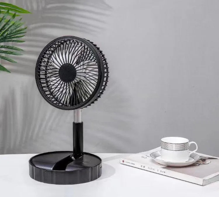 Black portable telescopic folding fan extended to full height with control panel visible