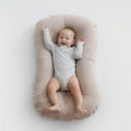 Portable cotton baby nest crib measuring 75x45cm with PP cotton filler in beige colour