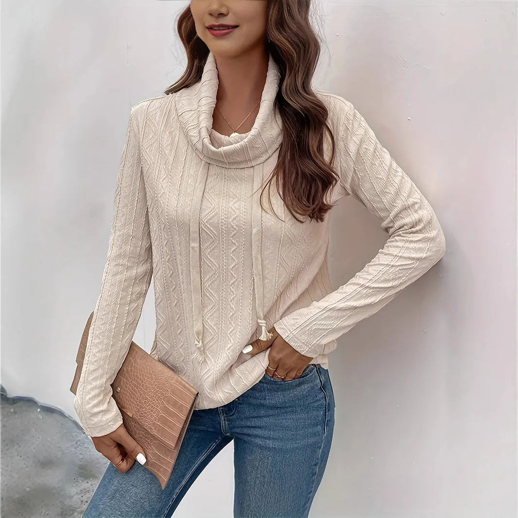 Apricot coloured hooded pullover sweater with drawstring and long sleeves