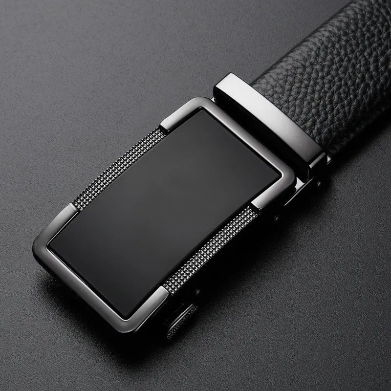 Men's leather automatic click belt in gold, silver, and gun black finishes showing buckle detail