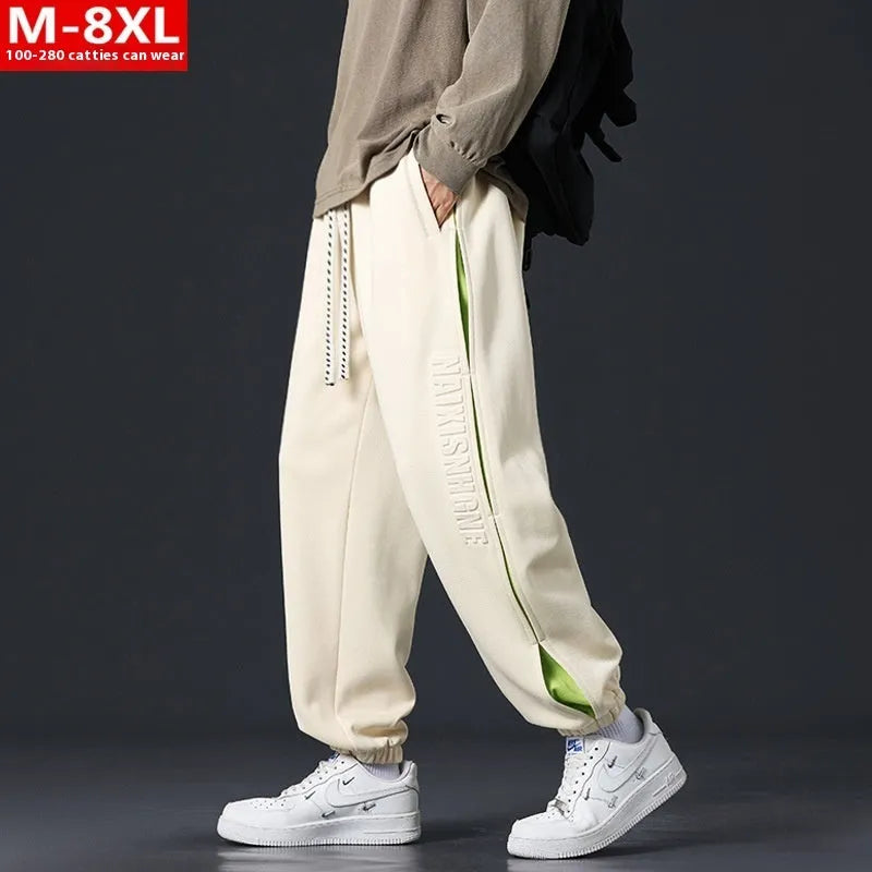Men's loose fit ankle banded trousers with stitching detail in various colours