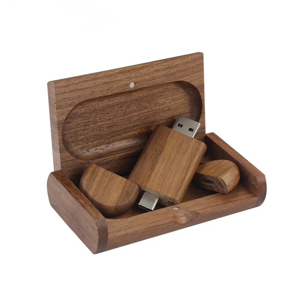 Maple wood carved USB flash drive with Type-C phone connector showing custom engraving