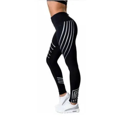 Women's black high-waist workout leggings with night-glowing prints made from milk silk fabric