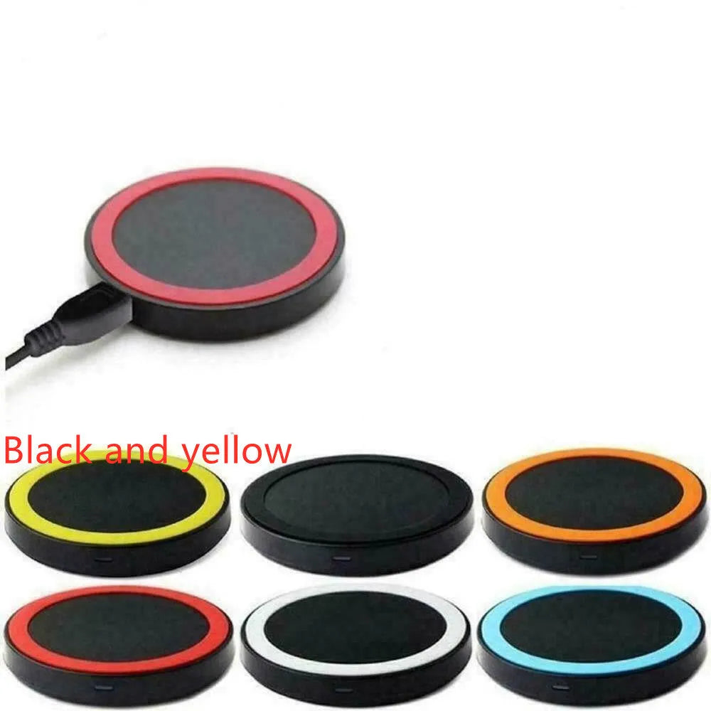 Square Qi wireless charging pad for mobile phones in multiple colours on a desk.