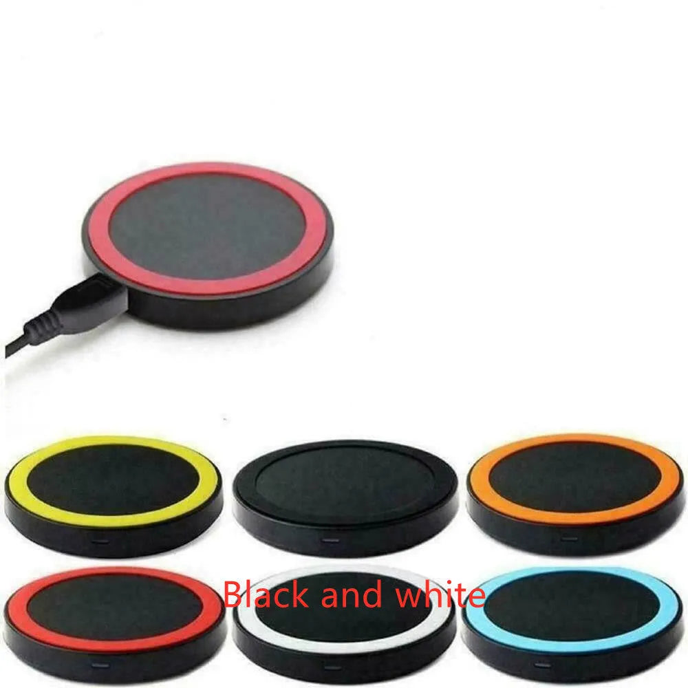 Square Qi wireless charging pad for mobile phones in multiple colours on a desk.