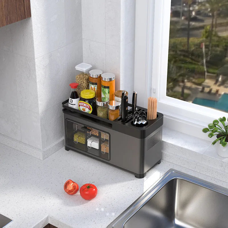 Multifunctional PP stainless steel kitchen storage box with lid holding seasoning bottles chopsticks and knives on a shelf