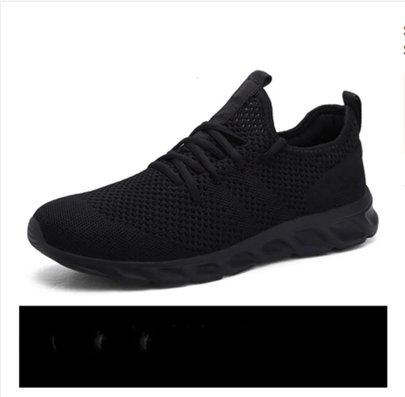 Men's black and white mesh sneakers with PVC sole and lace-up closure for casual jogging