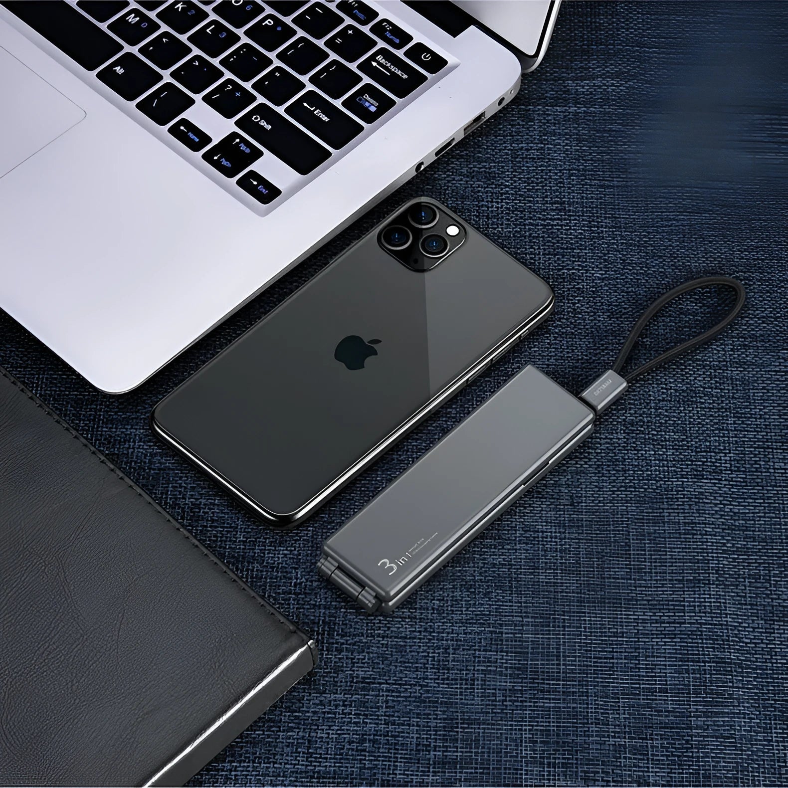 Black 3-in-1 portable charging cable showing iPhone, Type-C and Micro USB connectors.