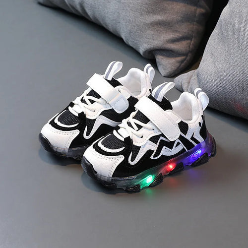 Children's bright light sports sneakers with mesh upper and Velcro fastening in black, grey, or pink colours