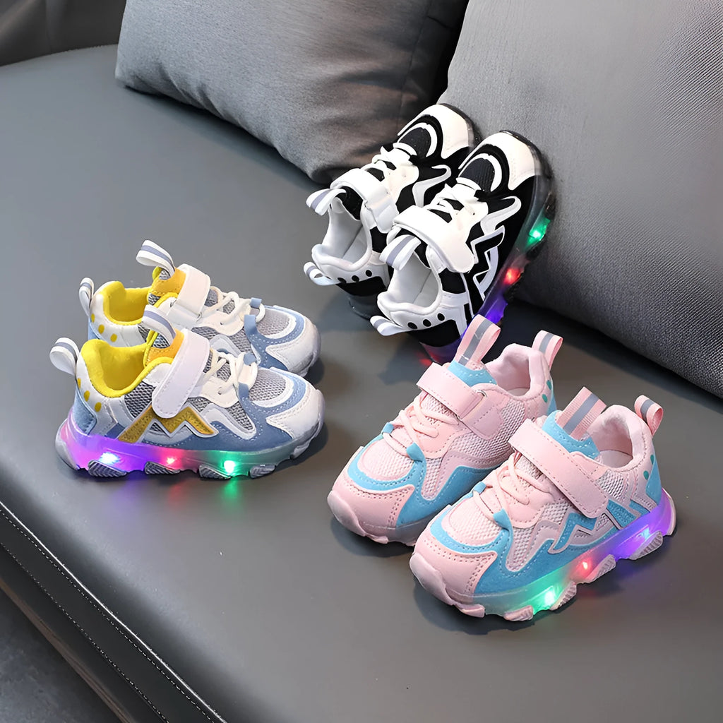 Children's bright light sports sneakers with mesh upper and Velcro fastening in black, grey, or pink colours