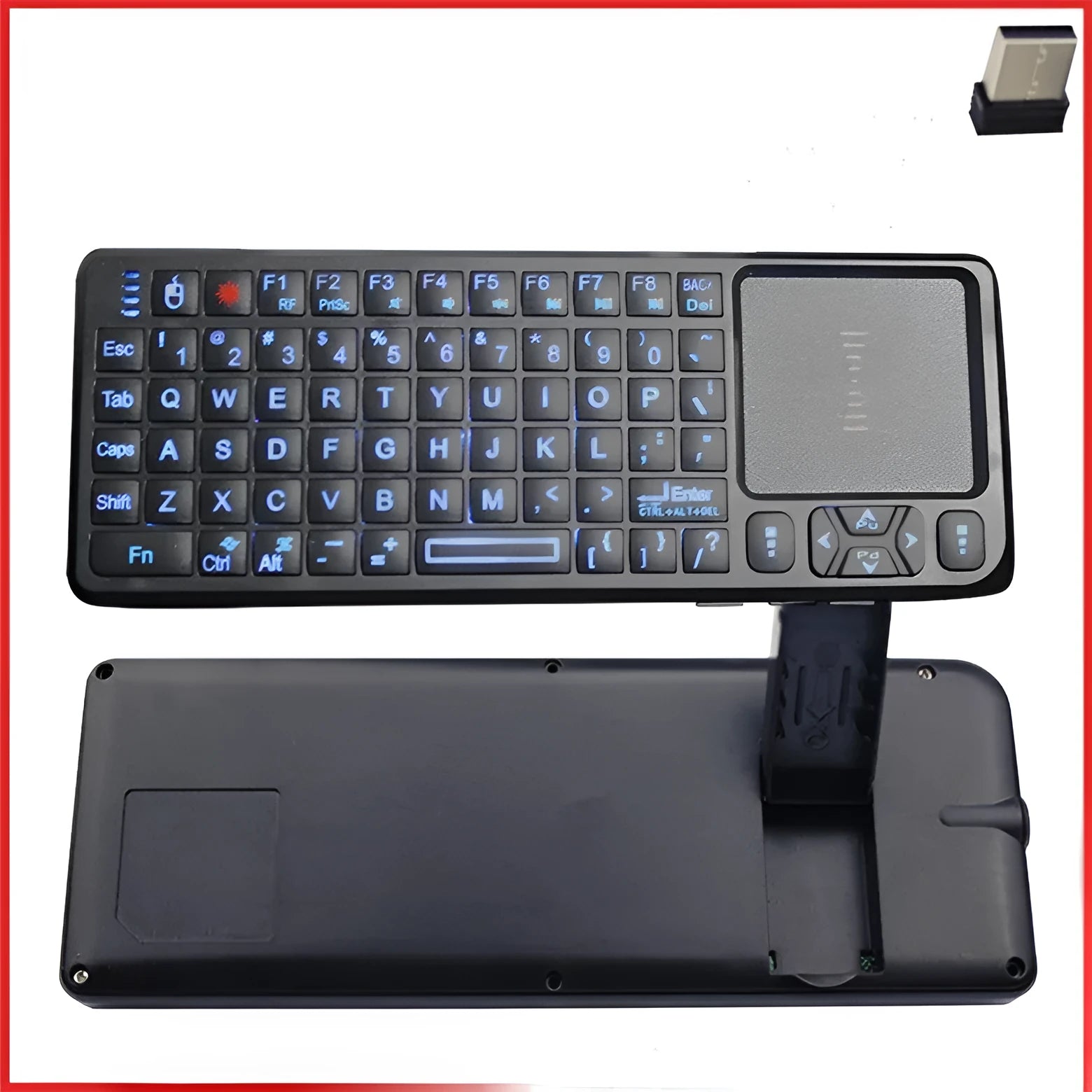 Black wireless laser teaching mini keyboard with touch screen on a desk next to a laptop.
