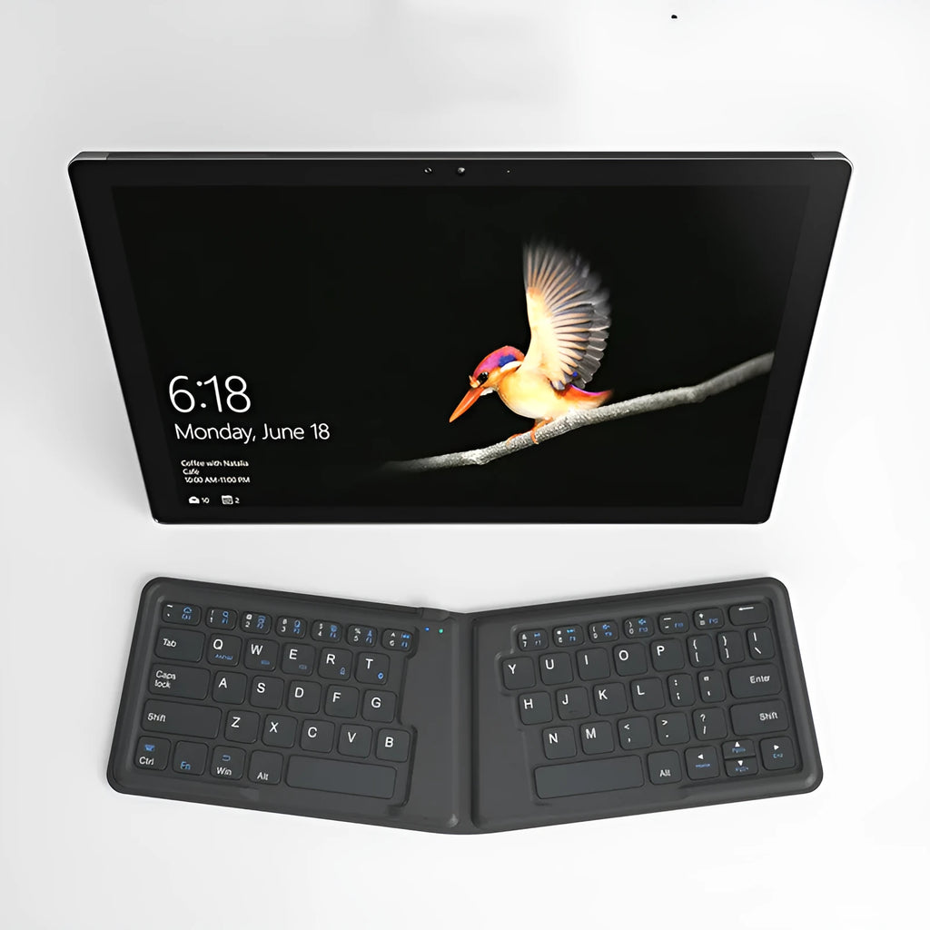 Folding Bluetooth keyboard with 64 keys X architecture ABS material USB charging for iPad tablet phone