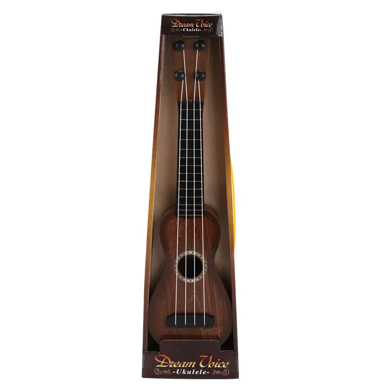 Yellow plastic simulation ukulele toy for children on a colour box background.