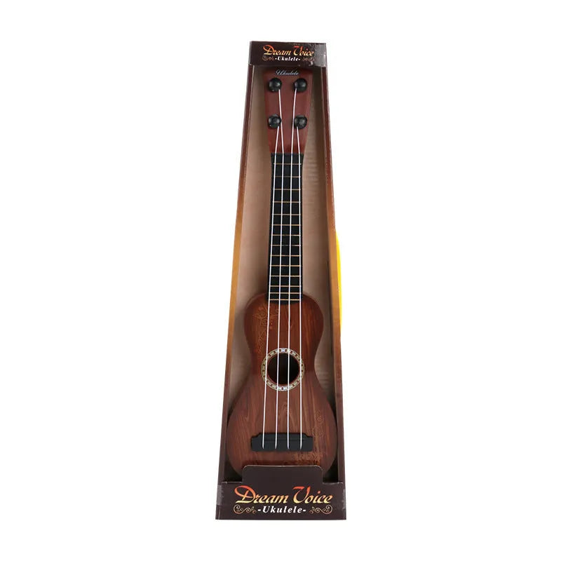 Yellow plastic simulation ukulele toy for children on a colour box background.