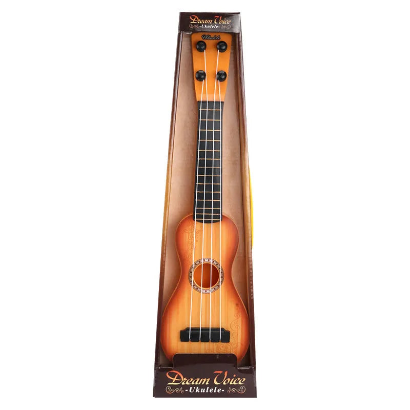 Yellow plastic simulation ukulele toy for children on a colour box background.